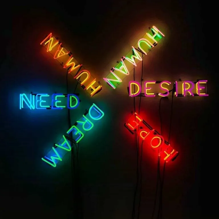 Neon sign with names of feelings lit up